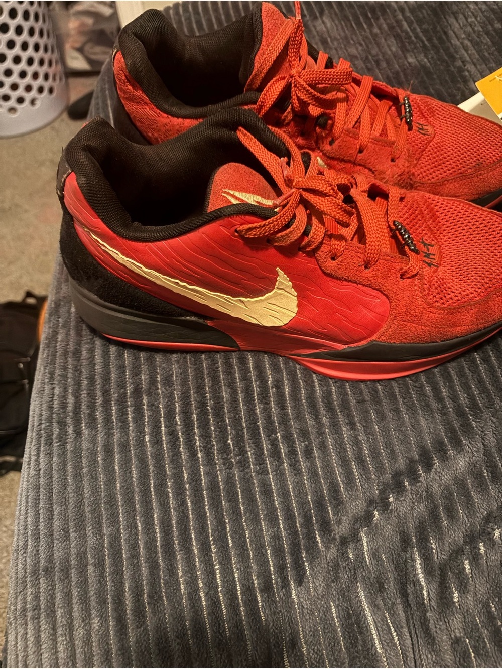 Nike Men's Red Athletic Shoes with Gold Swoosh